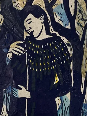 woman holding tree